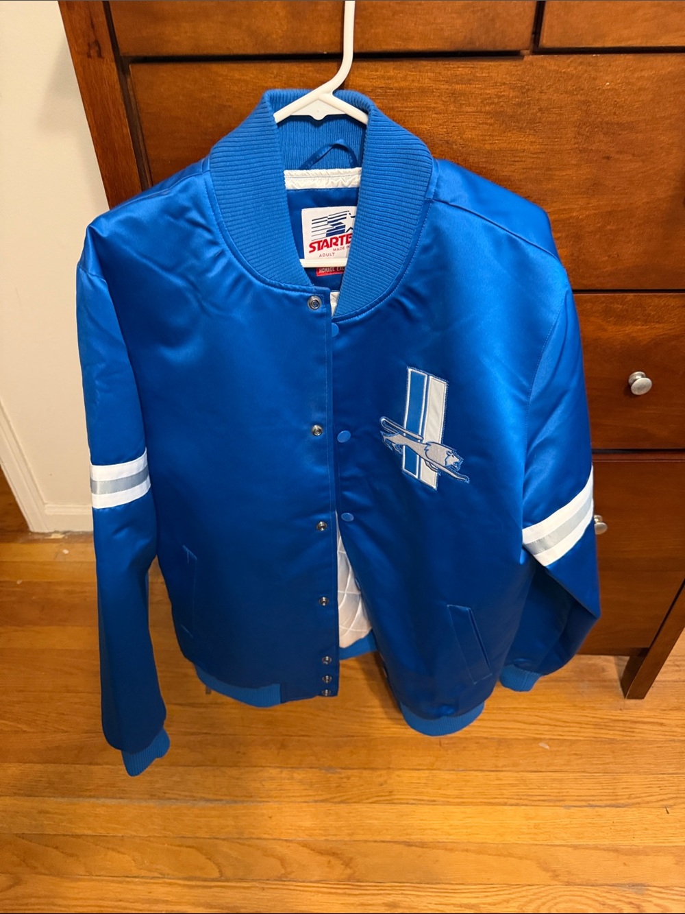 STARTER Detroit Lions Blue Satin Varsity Jacket with White Stripe Accents